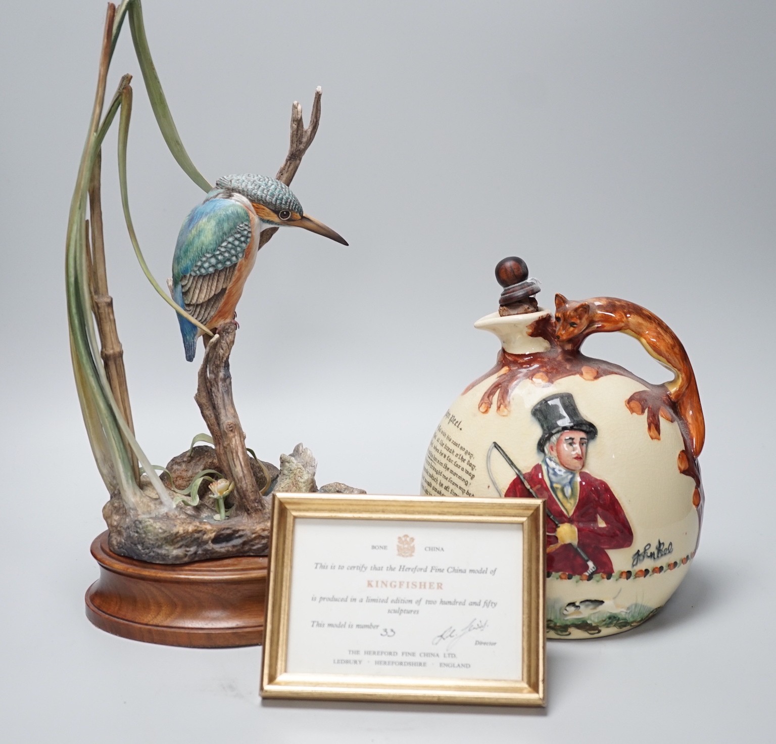 A musical John Peel jug and a Hereford Fine China kingfisher, together with its certificate. Tallest 36cm